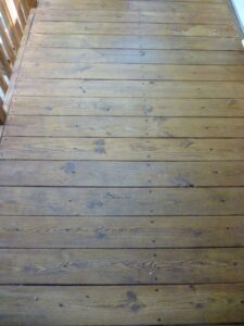 Those darker floorboards blend right in now after cleaning, brightening, and staining (2 coats wet-in-wet).