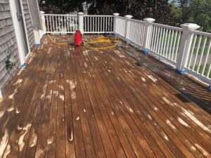 Most of the suds have been washed off and the deck is starting to dry.